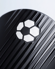 Close-up van het carbon weefsel op de mini scheenbeschermer