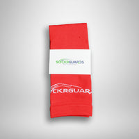 Rode voetbalsokken zonder voet, opgevouwen