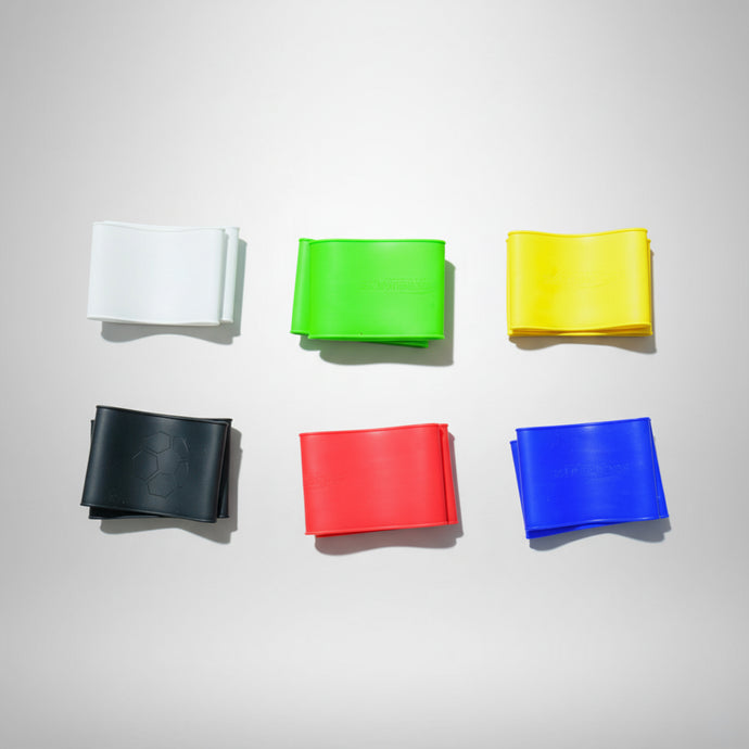 Scheenbeschermer bandjes in wit, groen, geel, zwart, rood en blauw